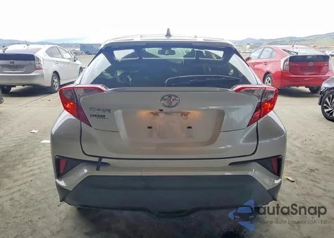 2019 Toyota C-Hr Le z USA, uszkodzony, nr VIN JTNKHMBX6K1047190